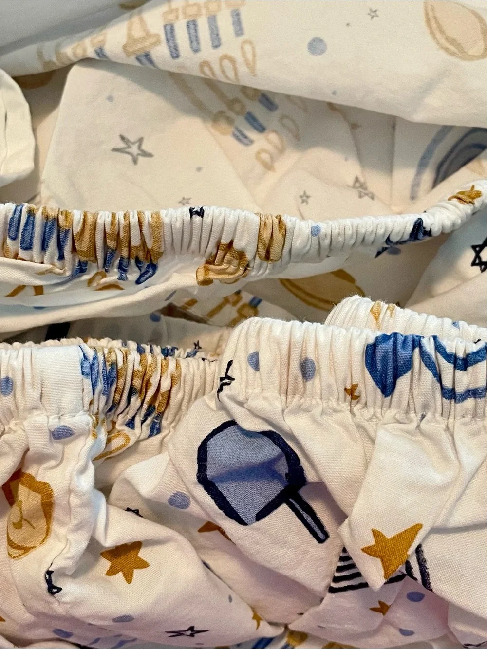 Pottery Barn Kids White Crib Sheet with Blue and Gold Hanukkah Motifs